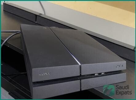 sony-playstation-4-in-excellent-condition-with-two-controllers-for-sale-in-riyadh-big-1