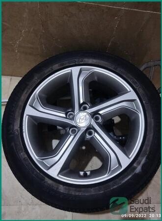 genuine-17-inch-wheels-tires-21555-excellent-condition-big-0