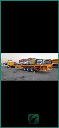 extendable-flatbed-trailer-with-man-vehicle-for-rent-in-dammam-big-0