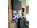 playstation-4-pro-1tb-with-games-and-accessories-in-dammam-small-0