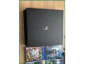 playstation-4-pro-1tb-with-games-and-accessories-in-dammam-small-1