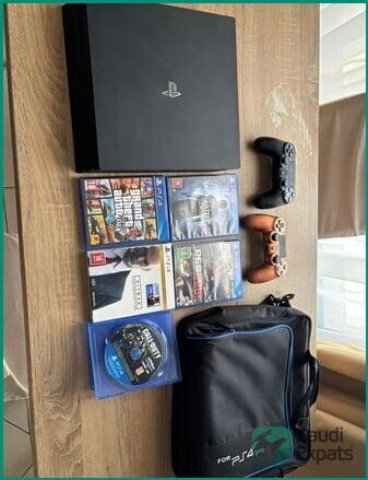 playstation-4-pro-1tb-with-games-and-accessories-in-dammam-big-0