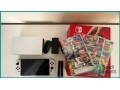 nintendo-switch-oled-64gb-with-3-games-for-sale-in-riyadh-small-0